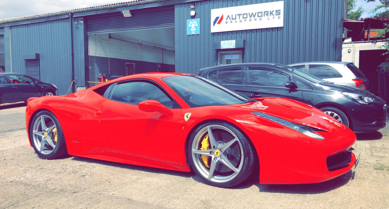 Red Ferrari 458 outside the Autoworks Bradford workshop